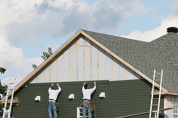 Professional Siding Contractor technician working in Spring Valley, IL